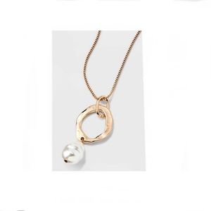 Hammered Ring and Pearl Drop Pendant Necklace.